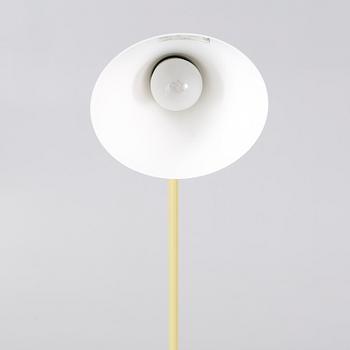 An "AJ" floor lamp, designed by Arne Jacobsen for Louis Poulsen, 21st century.