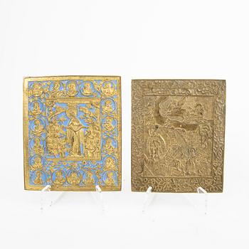 A set of four Russian brass and enamel icons 19th century or older.