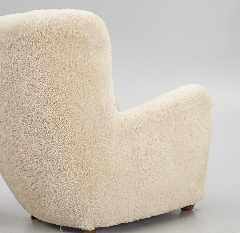 A pair of Danish Modern sheepskin armchairs, 1930's/40's.