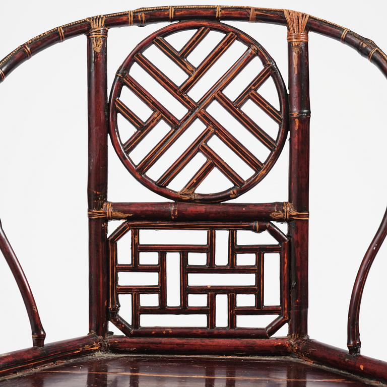 A Chinese bamboo horseshoeback armchair, late Qing dynasty.