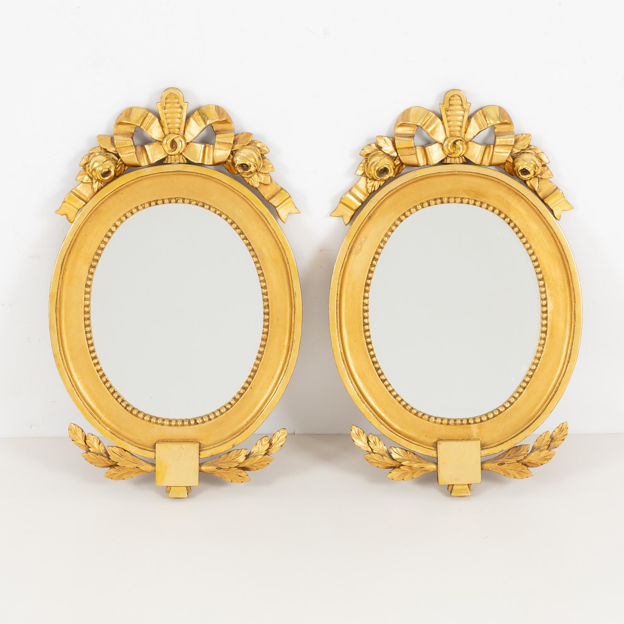 A pair of Gustavian style mirrors, 20th Century.