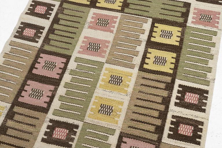 Märta Måås-Fjetterström, a carpet, 'Nyponblomman', flat weave, c. 163 x 105 cm, signed AB MMF.