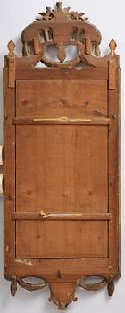 A Gustavian giltwood mirror, Stockholm, late 18th century.
