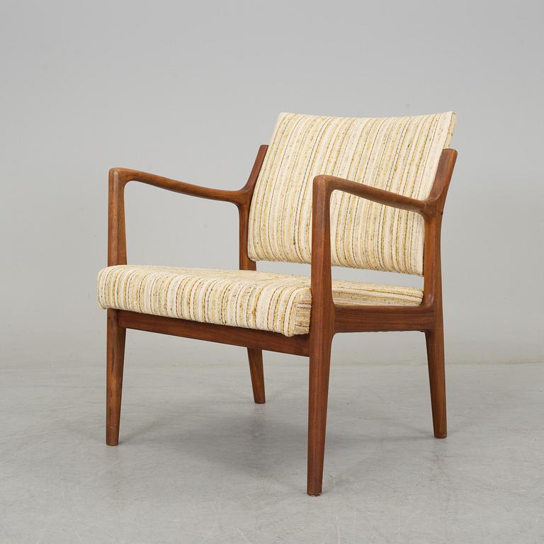 A 20th century easy chair.