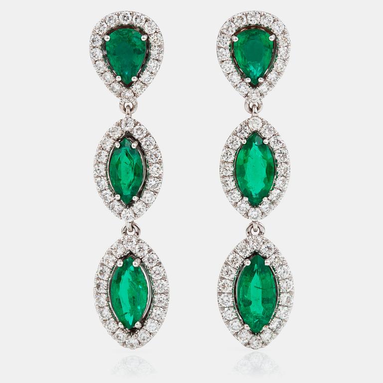A pair of emerald and brilliant-cut diamond earrings. Total carat weight of emeralds 4.27 cts, and diamonds 2.33 cts.