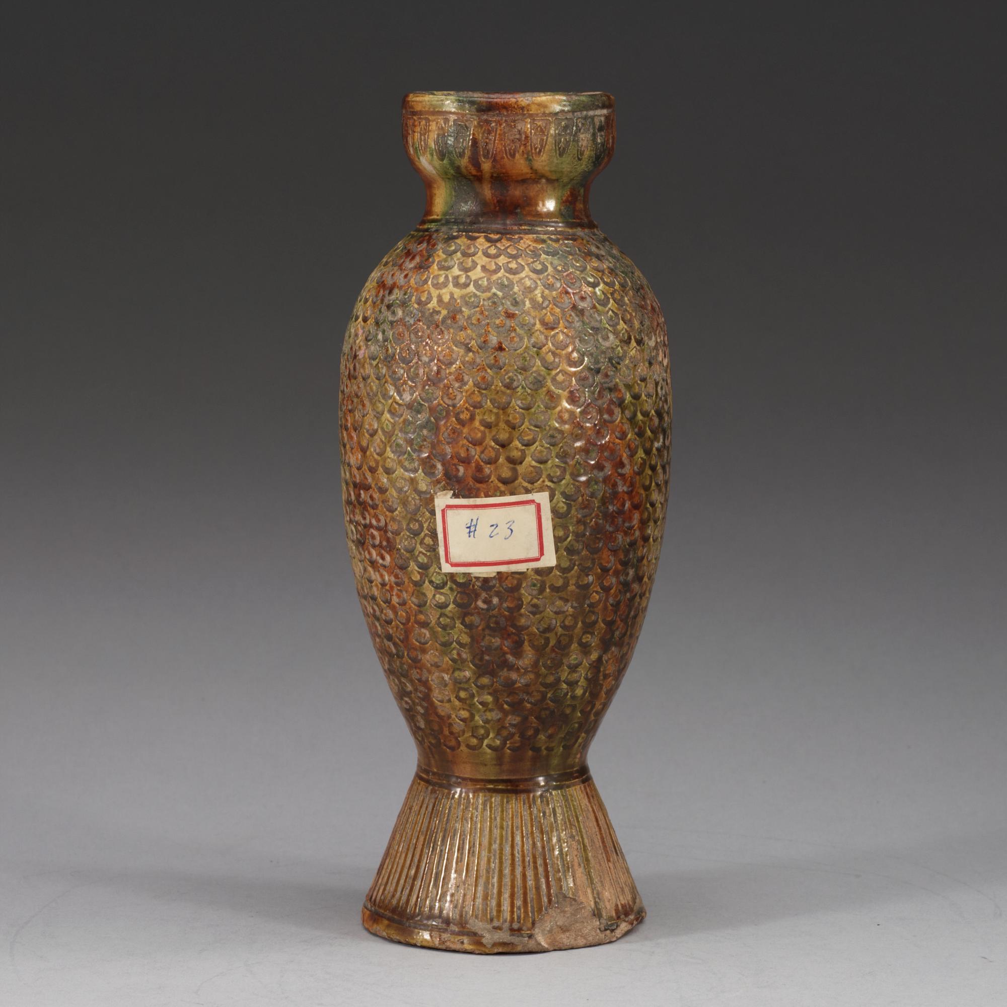 A potted fish shaped vase, presumably Tang dynasty.