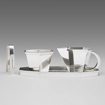 143. Wiwen Nilsson, a sterling set with tray, creamer, sugar bowl and a pair of tongues, Lund, Sweden 1964-69.