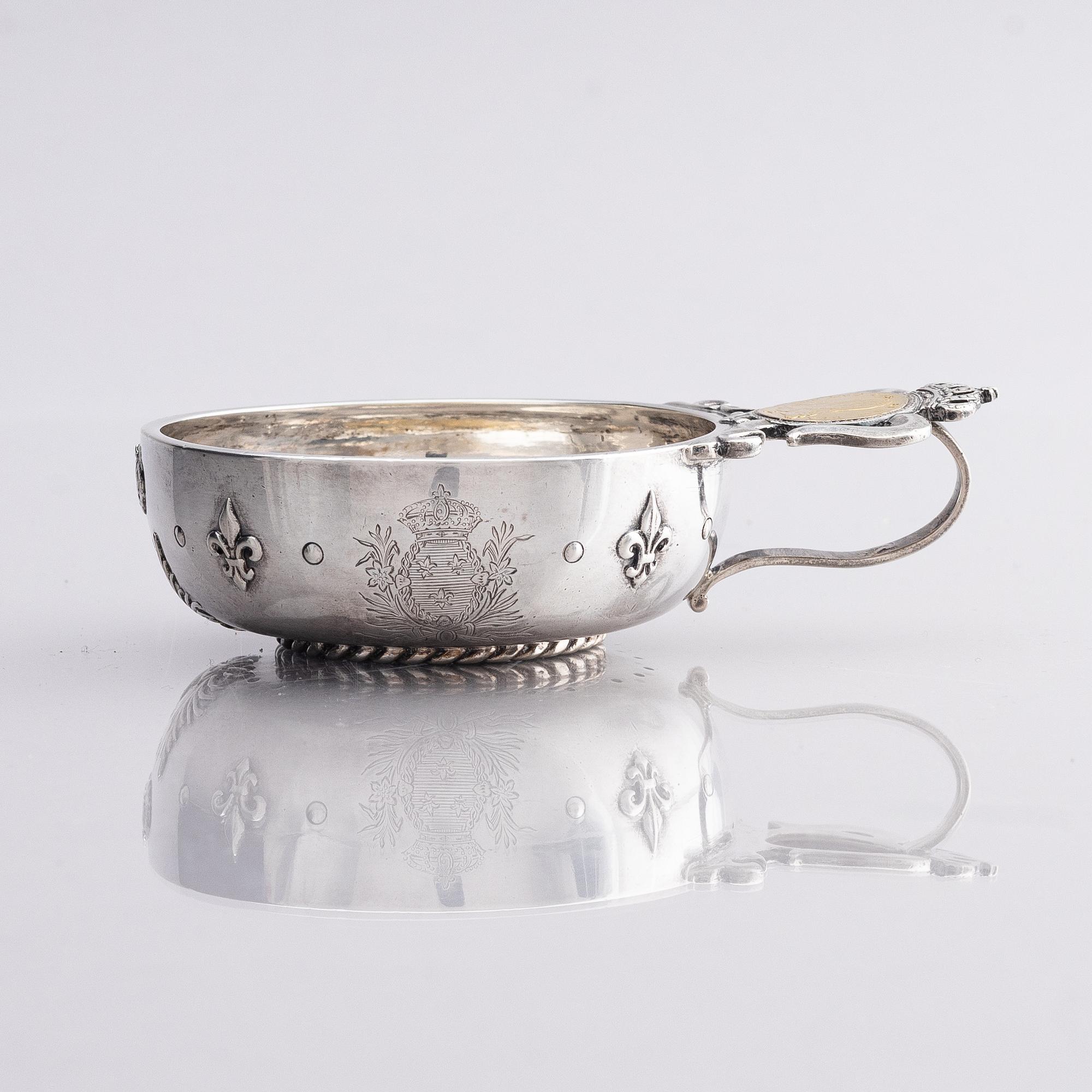 An 18th century French parcel-gilt silver tasse du vin (wine taster).