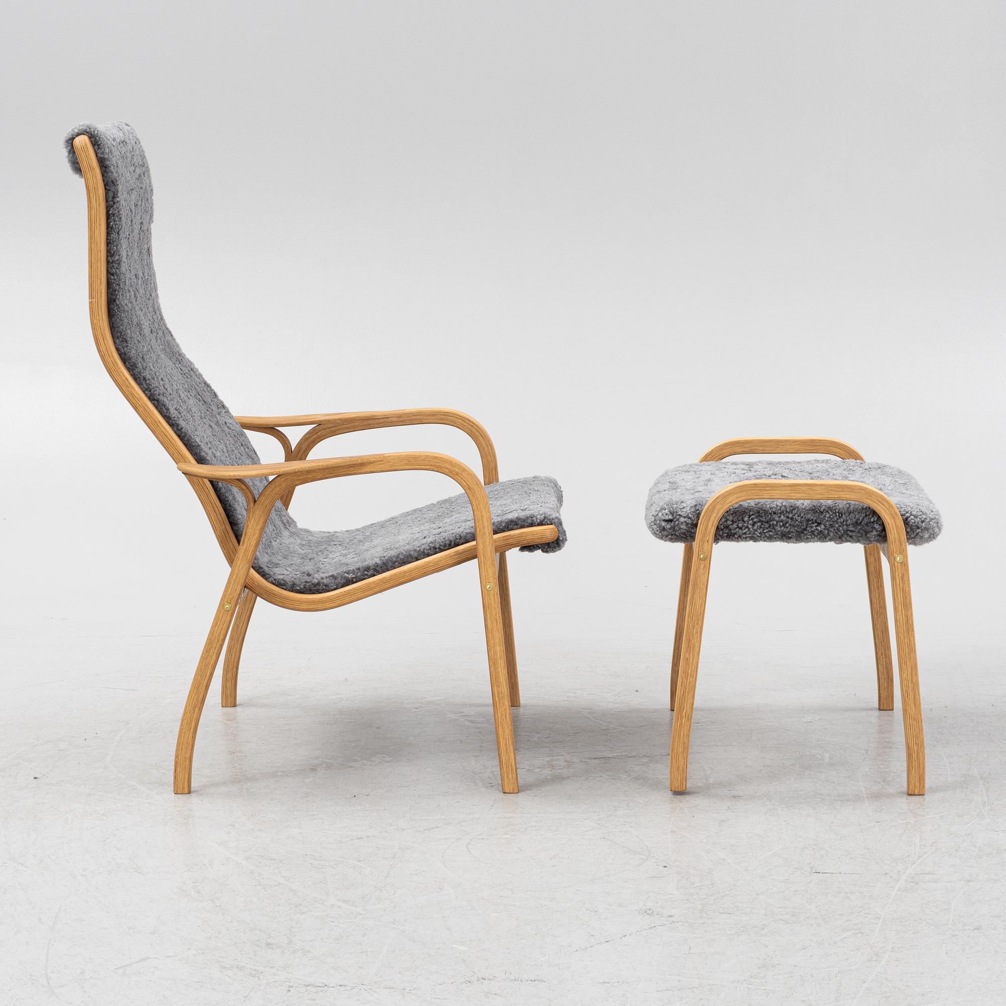 An Yngve Ekström armchair with footstool, "Lamino", Swedese, 21st century.