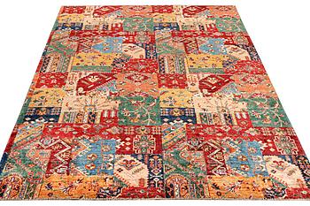 A Kazak carpet, c. 296 x 209 cm.
