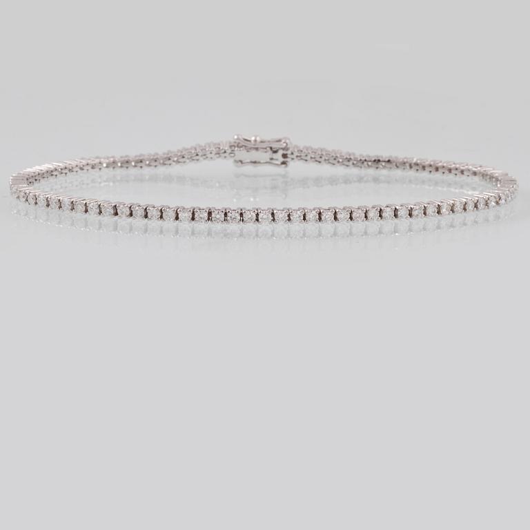 ARMBAND, 18K vitguld med briljantslipade diamanter, ca 2.20 ct, Milano, Italien. Vikt 8,2 gram.