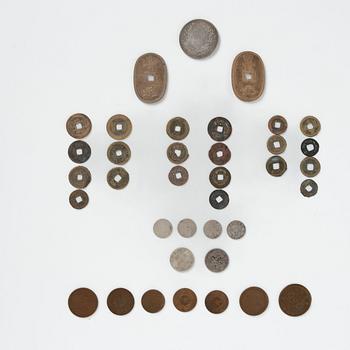 A group of Chinese coins, silver and copper, Qing dynasty and early 20th century.