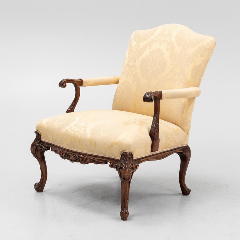 A carved mahogany George II armchair, 18th Century.