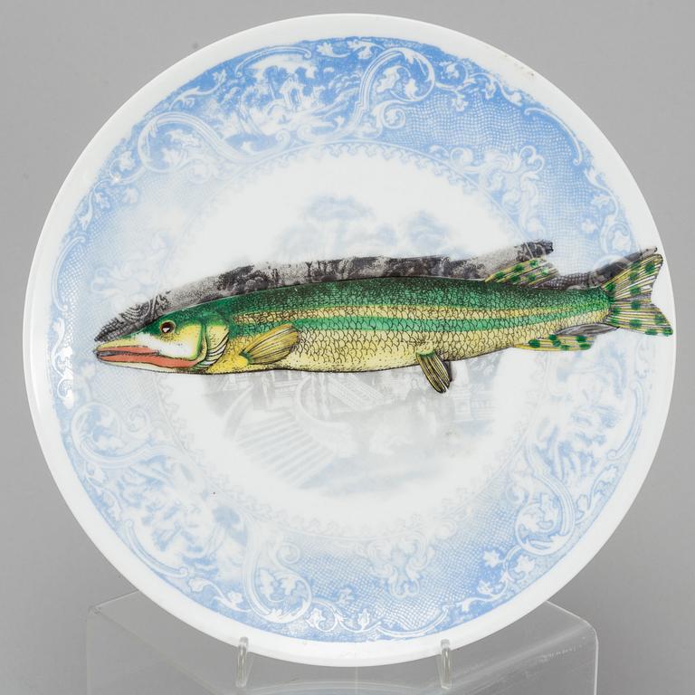 PIERO FORNASETTI, 2 "Arcimboldesca" plates + 1 "Piscibus" plate,