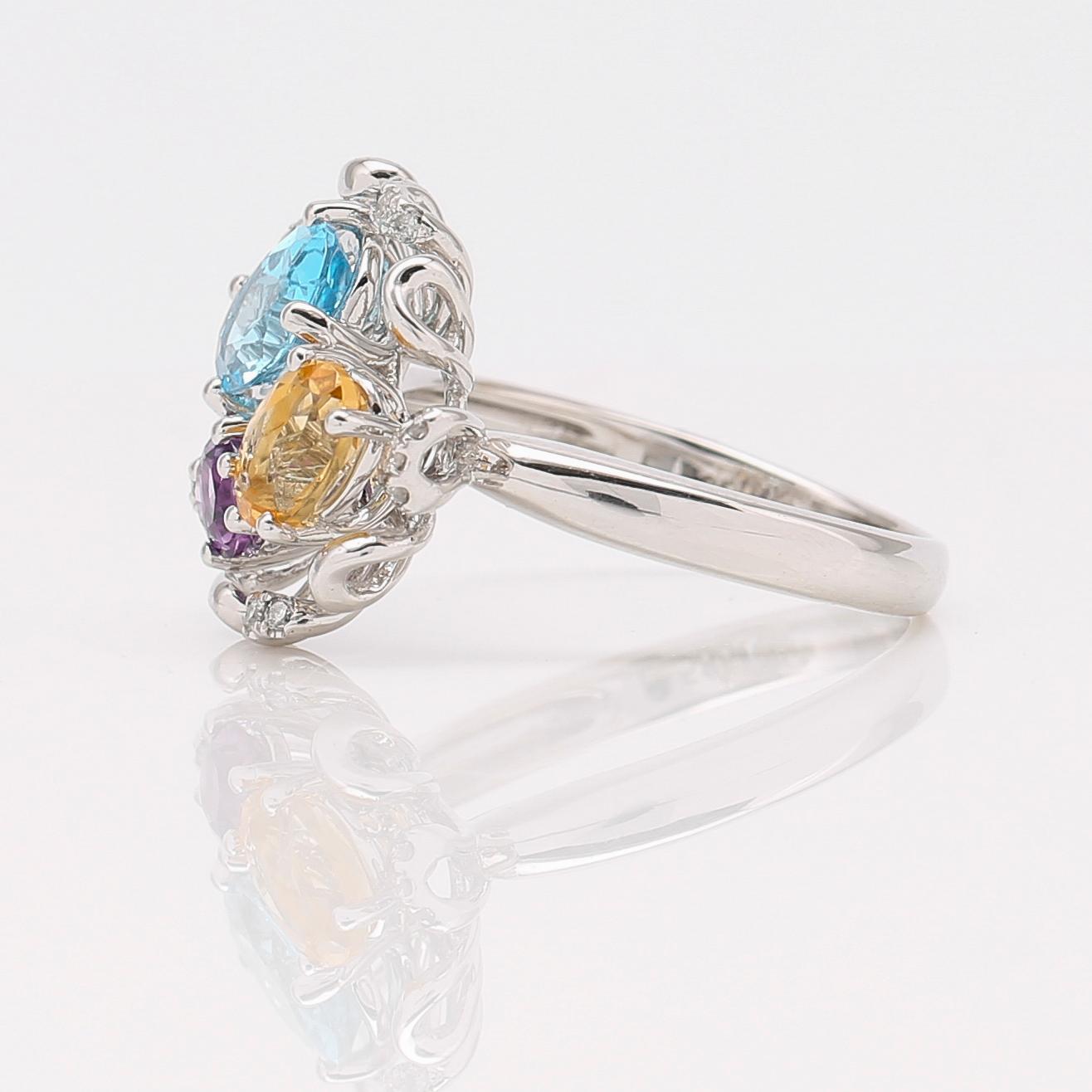 RING, 14K vitguld, blå topas, citrin och diamanter.