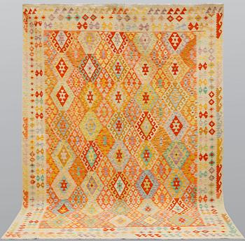 A carpet, Kilim, ca 344 x 252 cm.