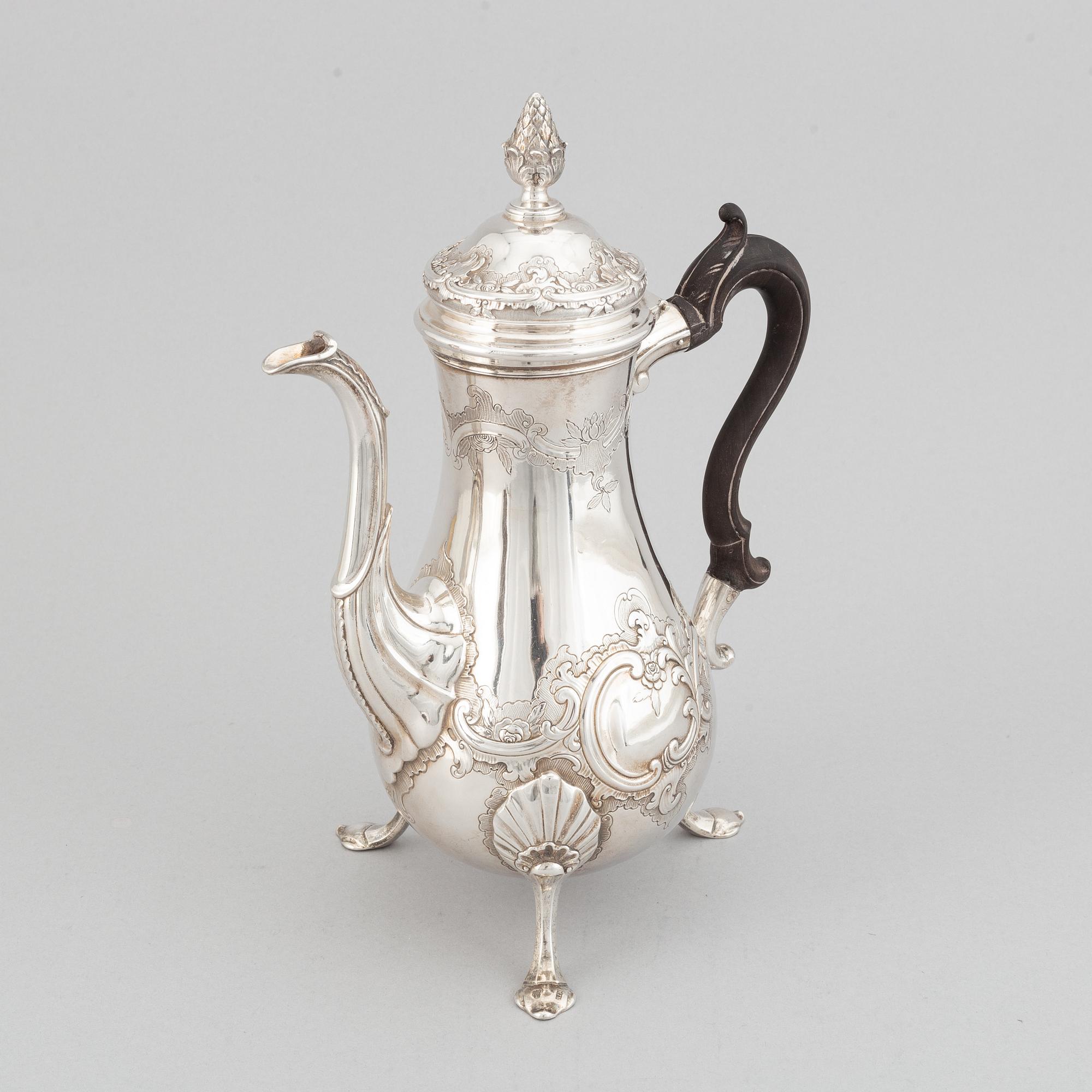 A parcel-gilt silver rococo coffee pot, teapot, creamer and bowl ...