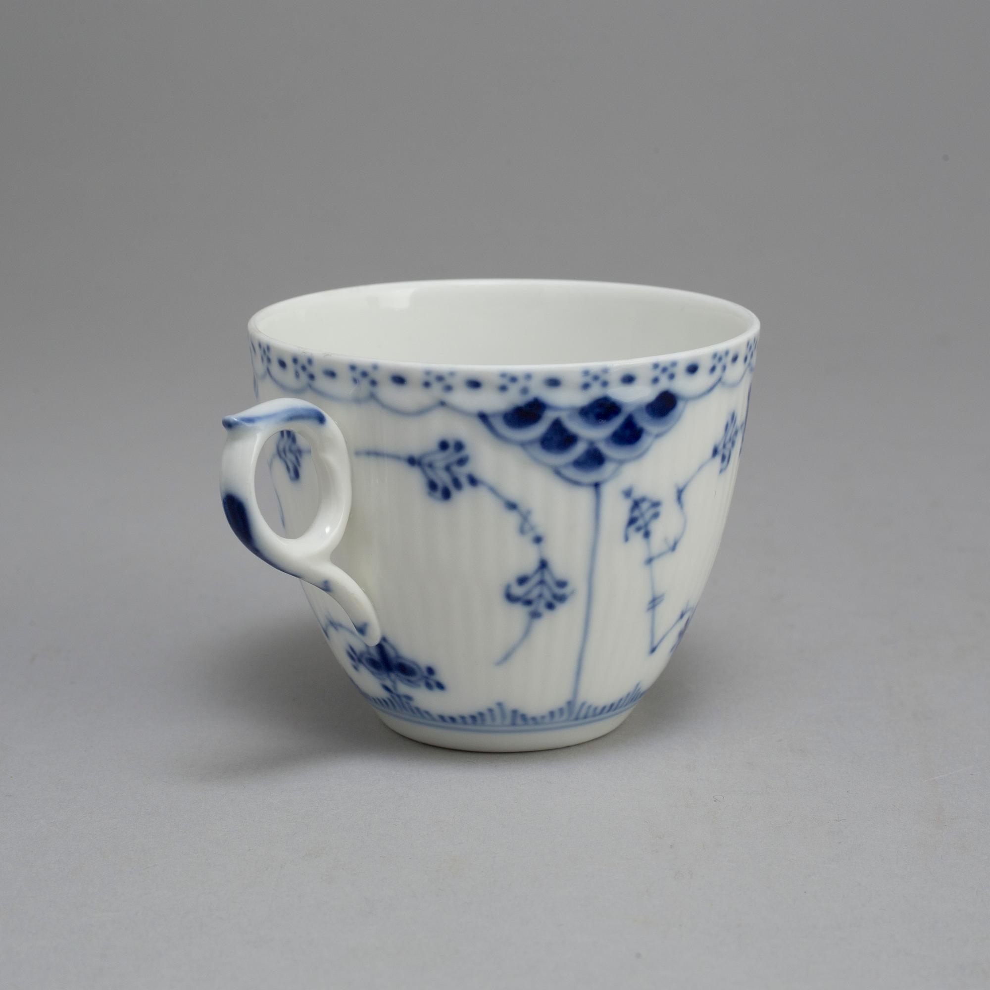 A set of six coffee cups with saucers and five plates, "Musselmalet"by Royal Copenhagen.