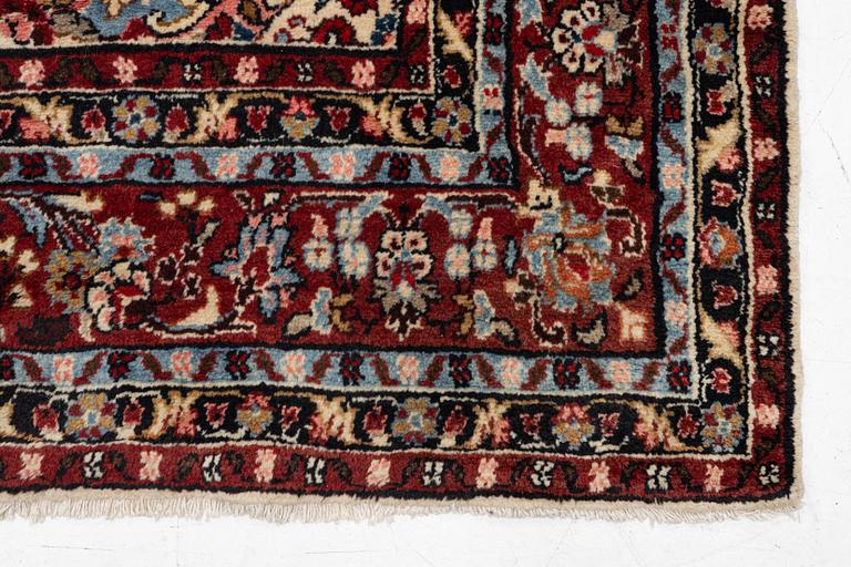 An oriental carpet, c. 370x260 cm.