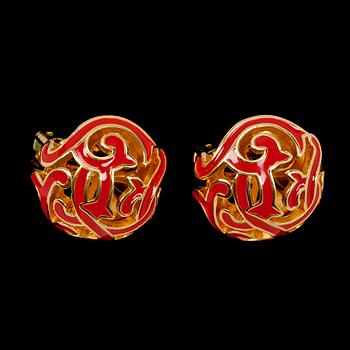 A set of two earclips by Christian Dior.
