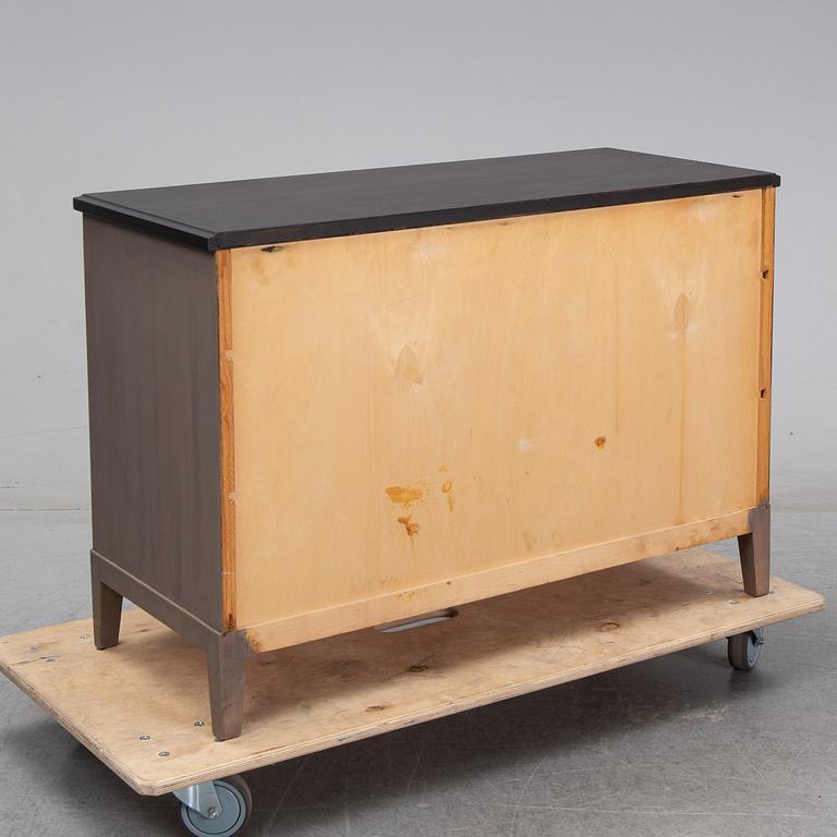 A painted chest of drawers, second half of the 20th Century.