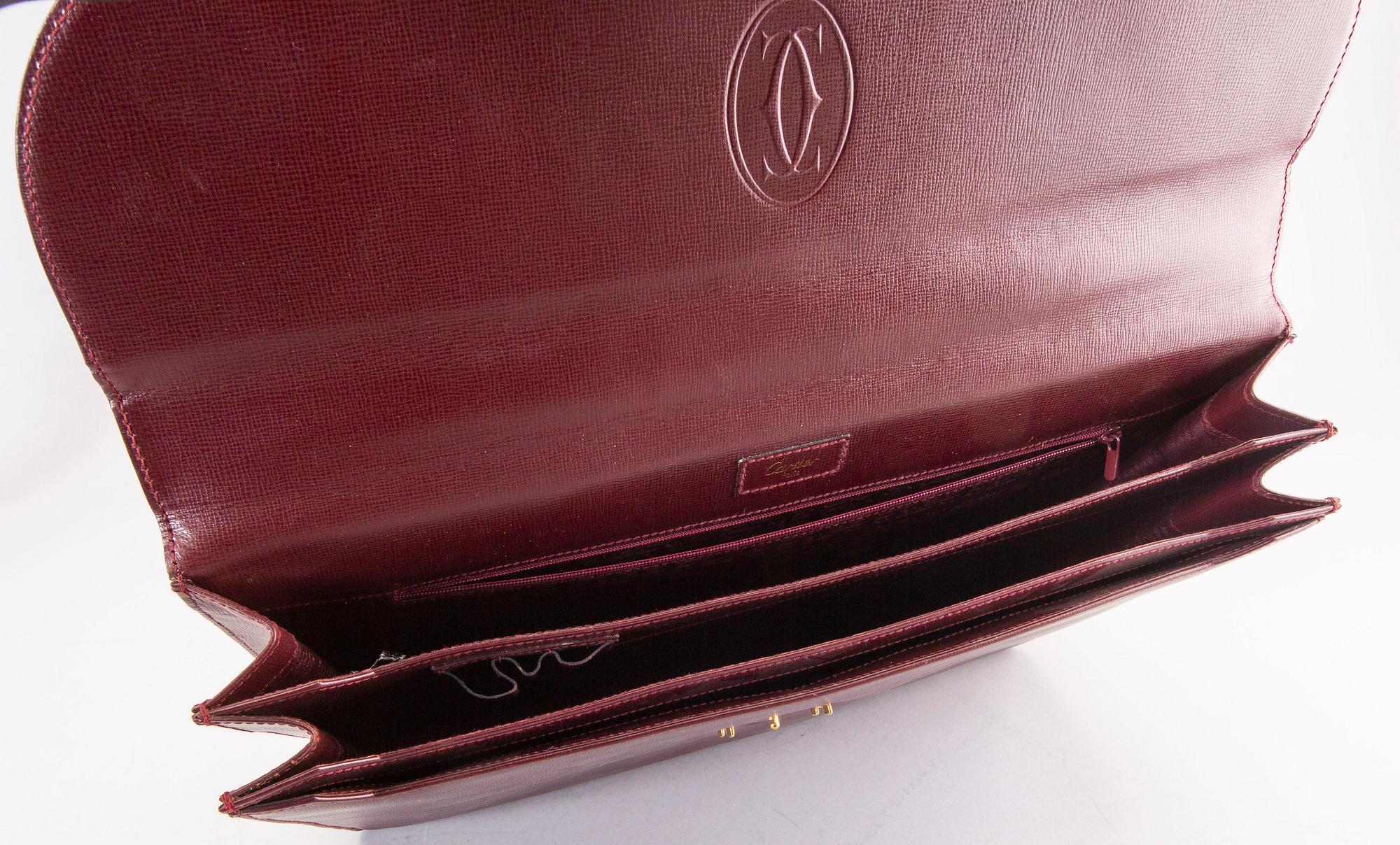 A Cartier leather briefcase.