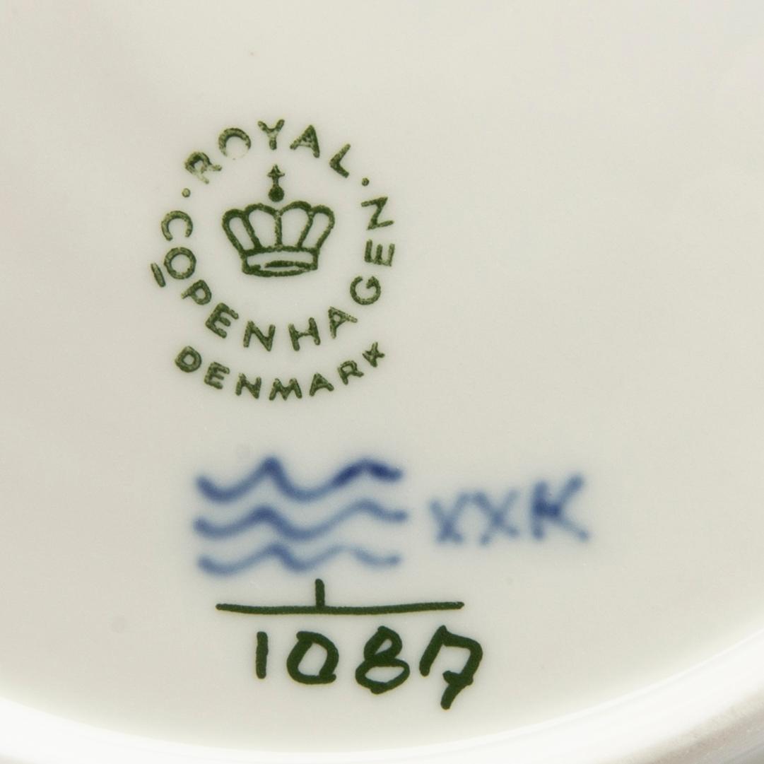 A Royal Copenhagen Musselmalet 74 pcs porcelain service alter part of the 20th century.