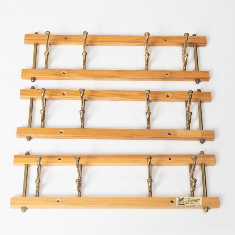 A set of three 'Decorative' coat hangers, Skoglunds metallgjuteri, Anderstorp, 1950s/60s.