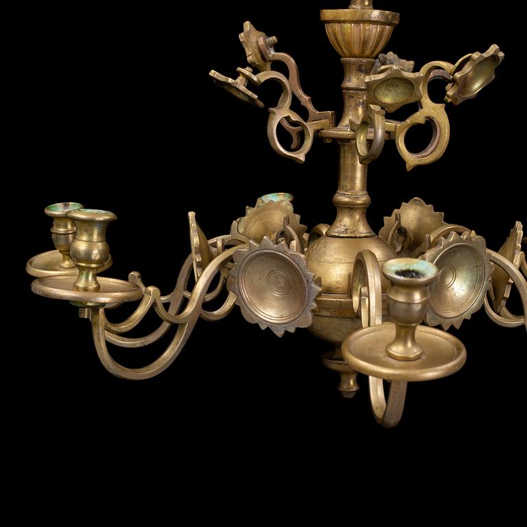 A Baroque and Baroque-style six-light chandelier.