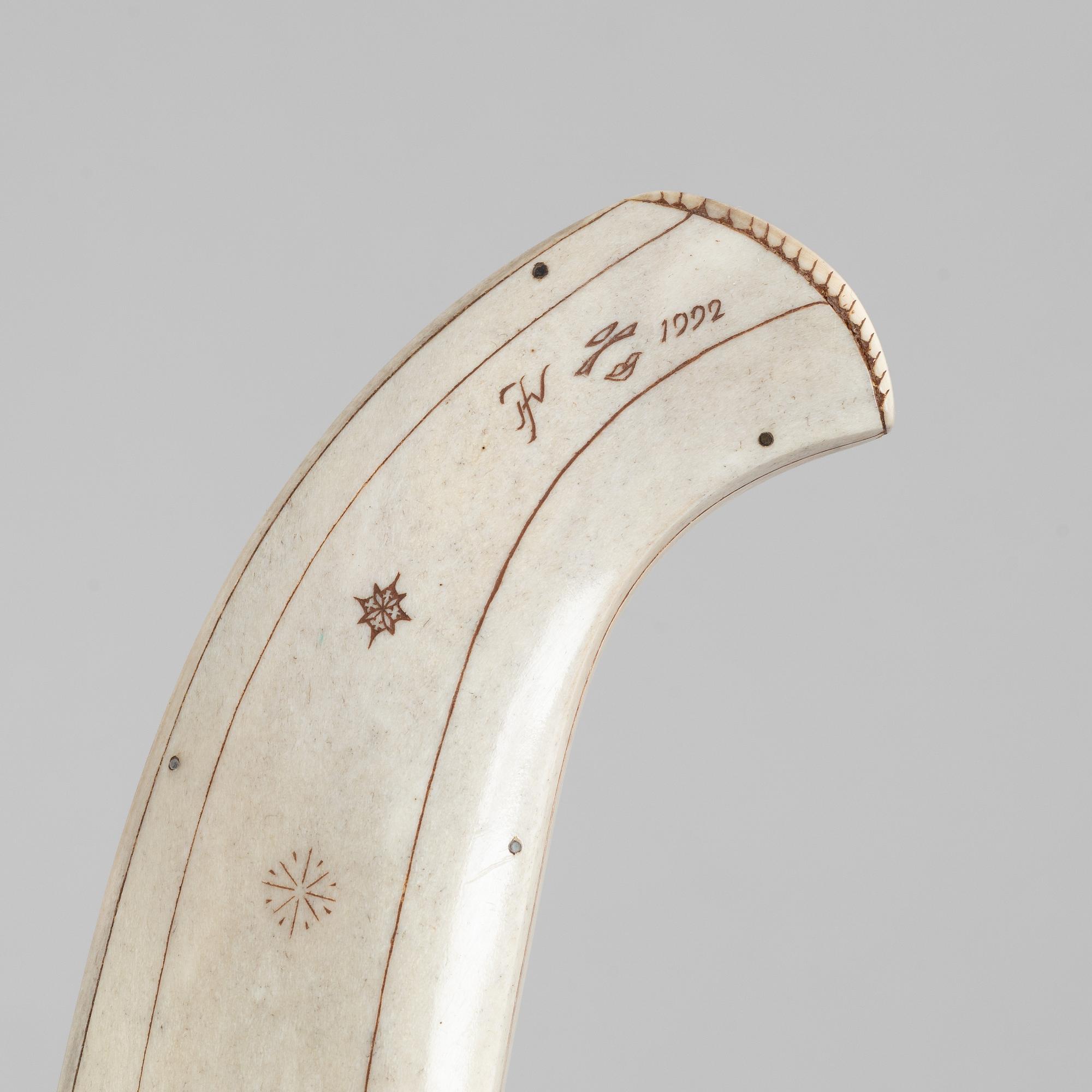 A knife, signed and dated 1992.