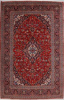 A Keshan rug, 357 x 270 cm.