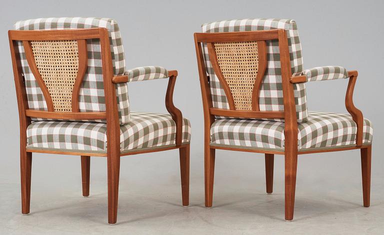 A pair of Josef Frank mahogany armchairs, Svenskt Tenn Sweden.