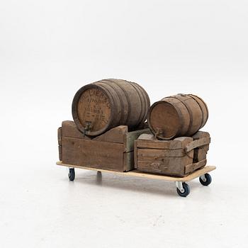 A pair of oak wine casks on stands, early 20th century.