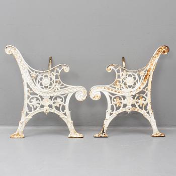 A pair of ends for a garden sofa, cast iron, 20th century.