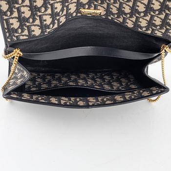 Christian Dior, handbag and wallet.