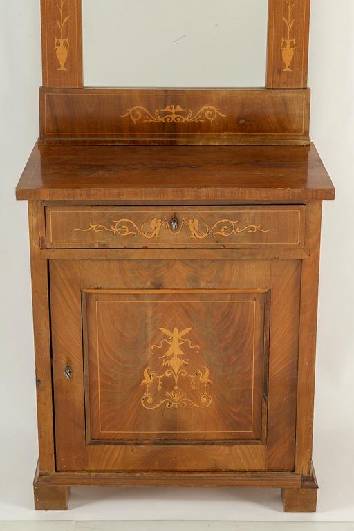 A mirror and cabinet from the mid 1800's.
