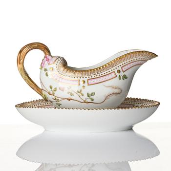 A Royal Copenhagen 'Flora Danica' sauce boat and a pillow shaped bowl, Denmark, 20th century.