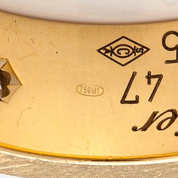 Cartier, an 18K gold 'Love' ring with three brilliant-cut diamonds.