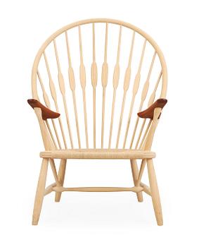 74. A Hans J Wegner ash and teak 'Peacock chair', by PP Møbler, Denmark.