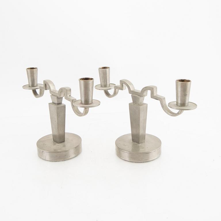 A pair of Firma Svenskt Tenn pewter candelabras 1933.