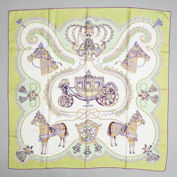 Hermès, a 'Paperoles' silk scarf.