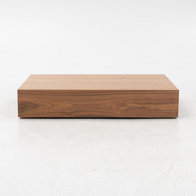 A 'Mass Wide' walnut veneered coffee table from New Works.