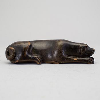 A 19th century snuff box in the shape of a dog.