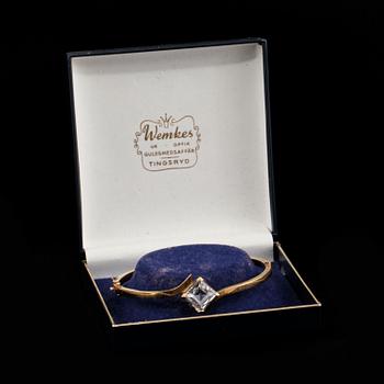 ARMRING, 18k guld och fasettslipad bergkristall, Svedboms Vetlanda. Vikt 10 g.