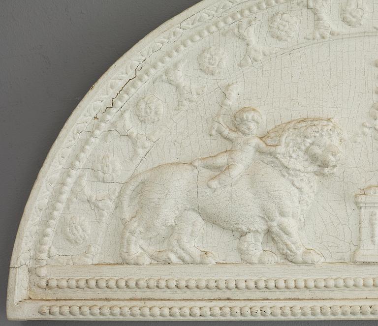 A late Gustavian carved and gesso crest, circa 1800.
