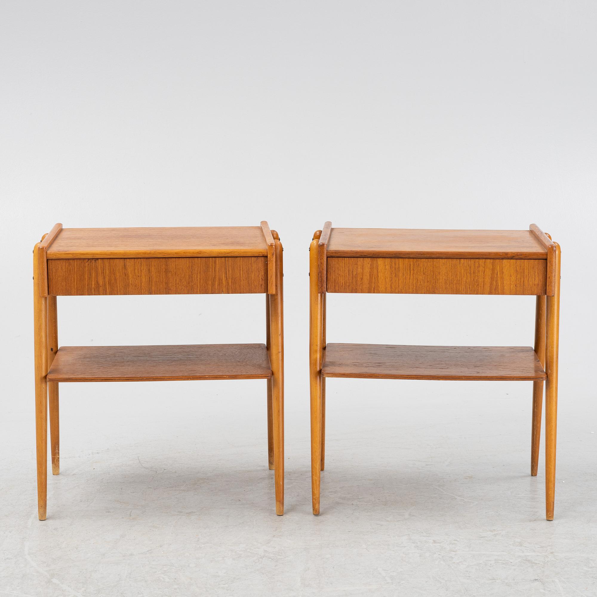 A pair of teak veneered bedside tables, 1960's.