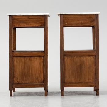 A pair of early 20th Century bedside tables.
