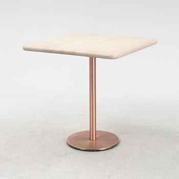 A steel and oak table by Jonas Lindvall 2011.