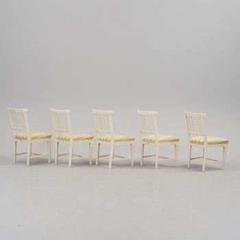 A set of five early 1800s chairs.