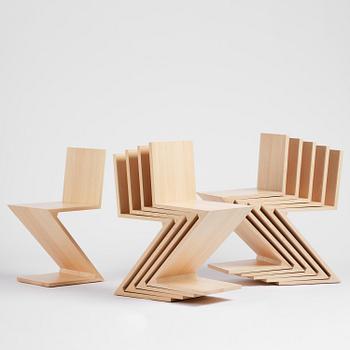 Gerrit Rietveld, a set of ten "Zig Zag" chairs, Cassina, Italy.